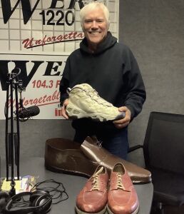 Chris Robert's Holding Shoes From The Tom Spiece Collection, Friday July 30th, 2021