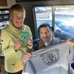 WIOE Listeners Get A WIOE Koozie and a Bob & Tom T-Shirt From Sister Station WGL
