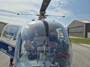 Family Prepares To Fly In Helicopter Lucy