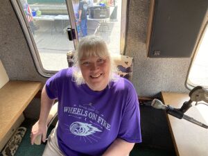 Christina takes a moment to broadcast live on WIOE from the Mentone Egg Festival